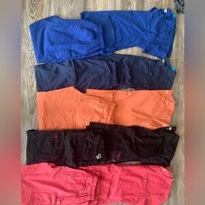 $15 set. Like new wonder wink scrubs. Orange and lavender sold